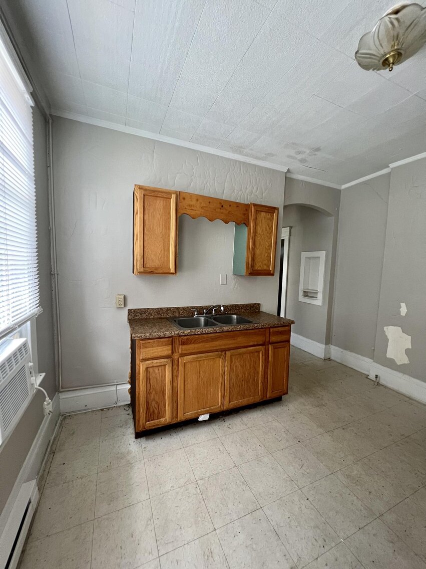 Image for SOLD $108,900 - Triplex Near the Capitol Selling to the Highest Bidder