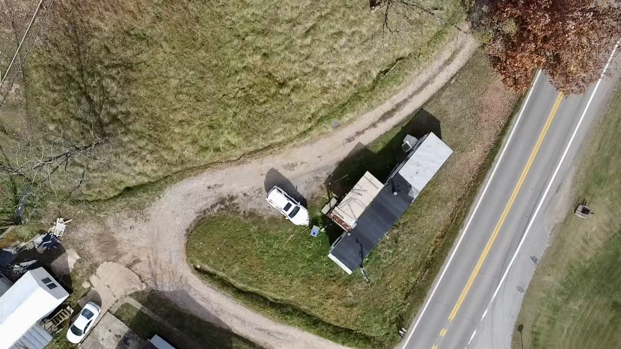 Image for SOLD $71,500 - Investment Opportunity – Three Homes & Mobile Home Park