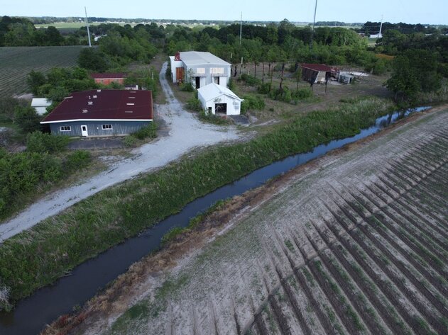 Image for SOLD! $59,400 - Bank Ordered ONLINE AUCTION 15 +/- Acre Industrial Warehouse in New Iberia, LA