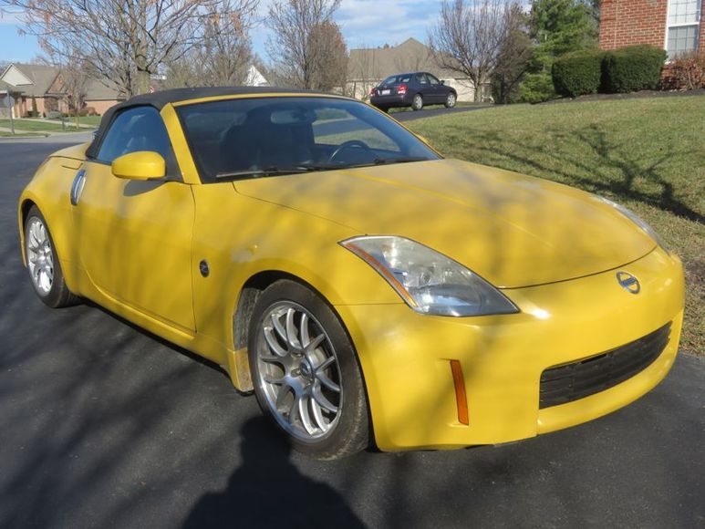 Image for 2005 NISSAN 350Z and 2003 CADILLAC SEVILLE SLS