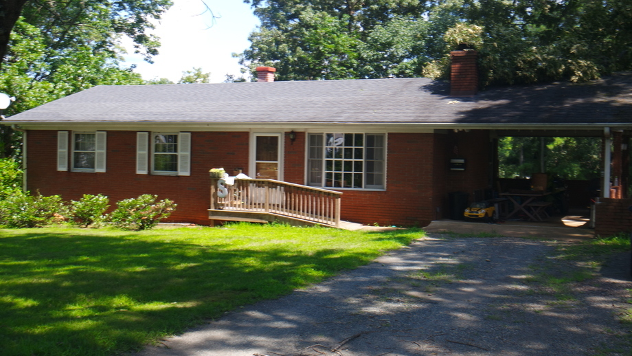 Image for Offering #1:  .88+/- Acres with 5BR/3BA brick home w/basement featuring living room, dining room, eat-in kitchen, laundry room. Selling to the Highest Bidder Regardless of Price!!