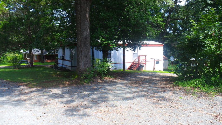 Image for 1,400' +/- of Rt. 29 Frontage!!  16.24 +/- Acres Offered in 2 Parcels:  .88 +/- Acres w/5 BR/3 BA Home and 15.33 +/- Acres w/Mobile Home Park, Former Motel & Outbuildings.  Selling to the Highest Bidder Regardless of Price!!