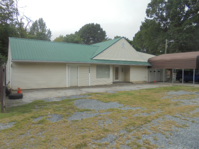 Image for REAL ESTATE AUCTION~ 4/BR 1.5/BA w/Garage/Shop/Apartment/Store ~Randleman