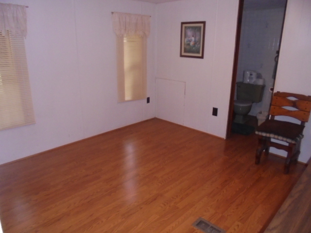 Image for REAL ESTATE AUCTION~ 4/BR 1.5/BA w/Garage/Shop/Apartment/Store ~Randleman