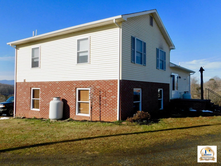 Image for 3 BR/2 BA Home on 11.7 +/- Acres w/12 Stall Barn, 3 Pole Barns, Fencing & Amazing Mountain Views in Madison County, VA--Sells to the Highest Bidder!!