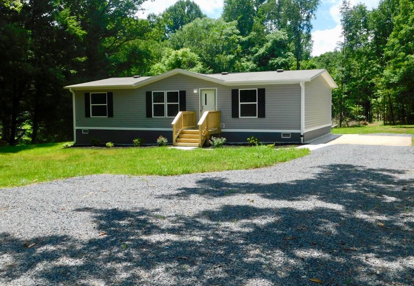 New 3 BR/2 BA Clayton Home on 4.6 +/ Acres in Orange, ONLY BIDDING!!