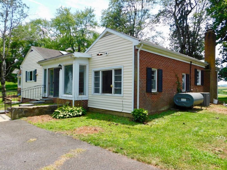 5 BR/3.5 BA Brick Home on 1.1 +/ Acres in the Town of Orange, VA