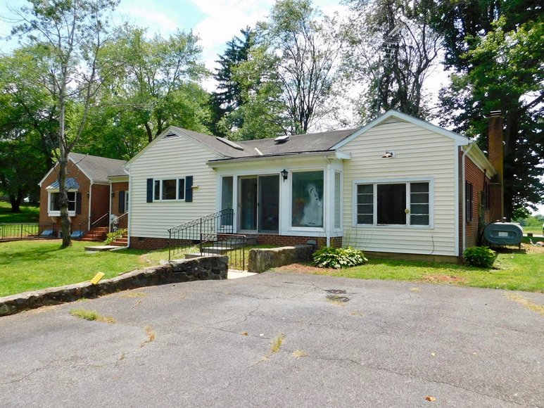 5 BR/3.5 BA Brick Home on 1.1 +/ Acres in the Town of Orange, VA