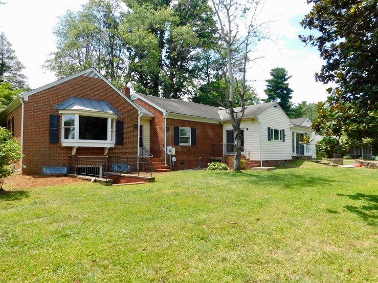5 BR/3.5 BA Brick Home on 1.1 +/ Acres in the Town of Orange, VA