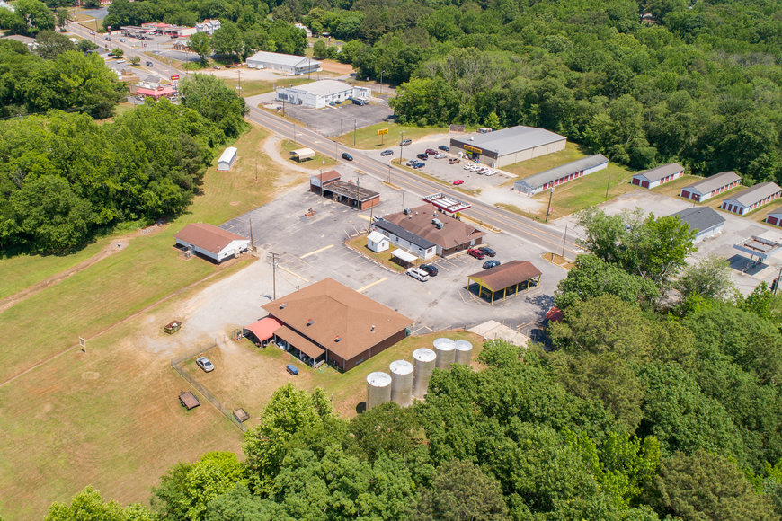 Image for Operational Convenience Store, Laundromat, Car Wash, Storage Units & Office Building on 8+ Acres--SELLING to the HIGHEST BIDDER!!