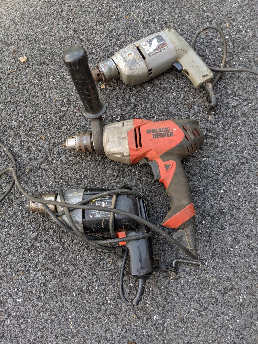 Three Black and Decker 1/2" Drills