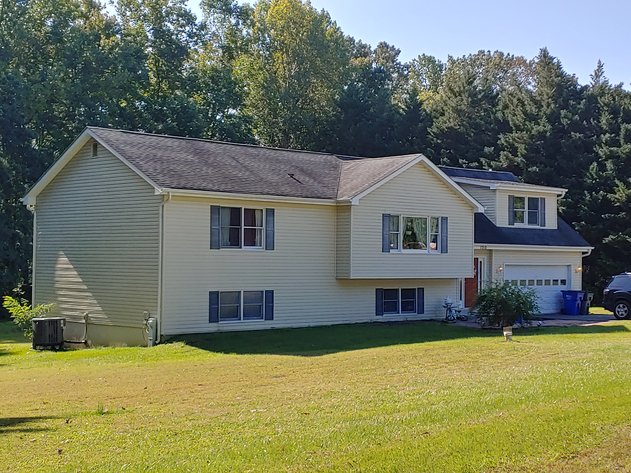 4 BR 2 BA TRI LEVEL HOME ON PRIVATE LOT  2 PARCELS TOTALING 1.1+/- ACRES