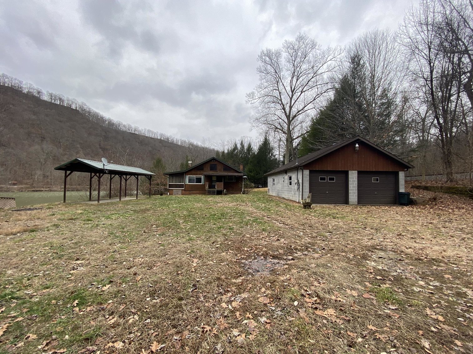 Image for SOLD $161,700 - Riverfront Camp with 3 Bedroom Cabin