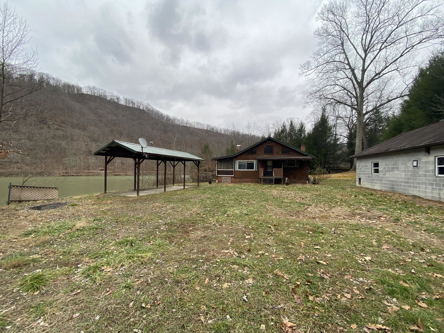 Image for SOLD $161,700 - Riverfront Camp with 3 Bedroom Cabin