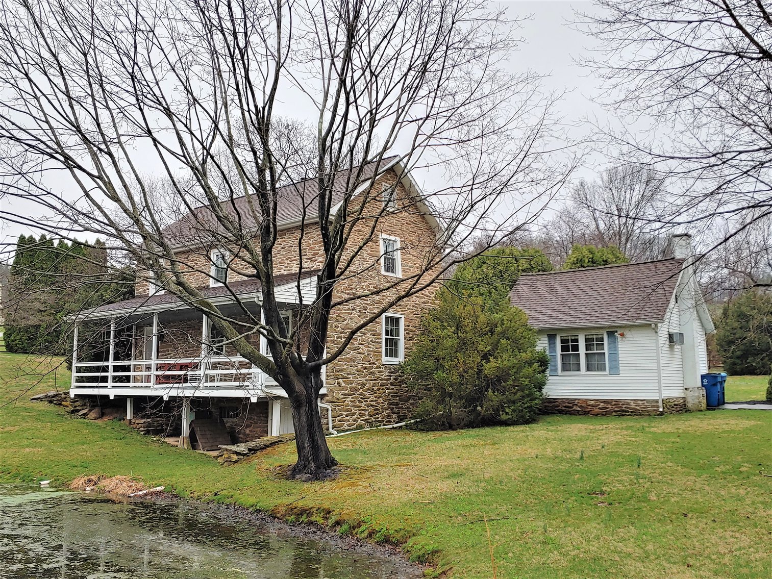 Image for 3 BR, 2.5 BA HISTORIC STONE HOME W/ DETACHED 2 CAR GARAGE & SUMMER HOME OVERLOOKING POND ON 14.04+/- AC