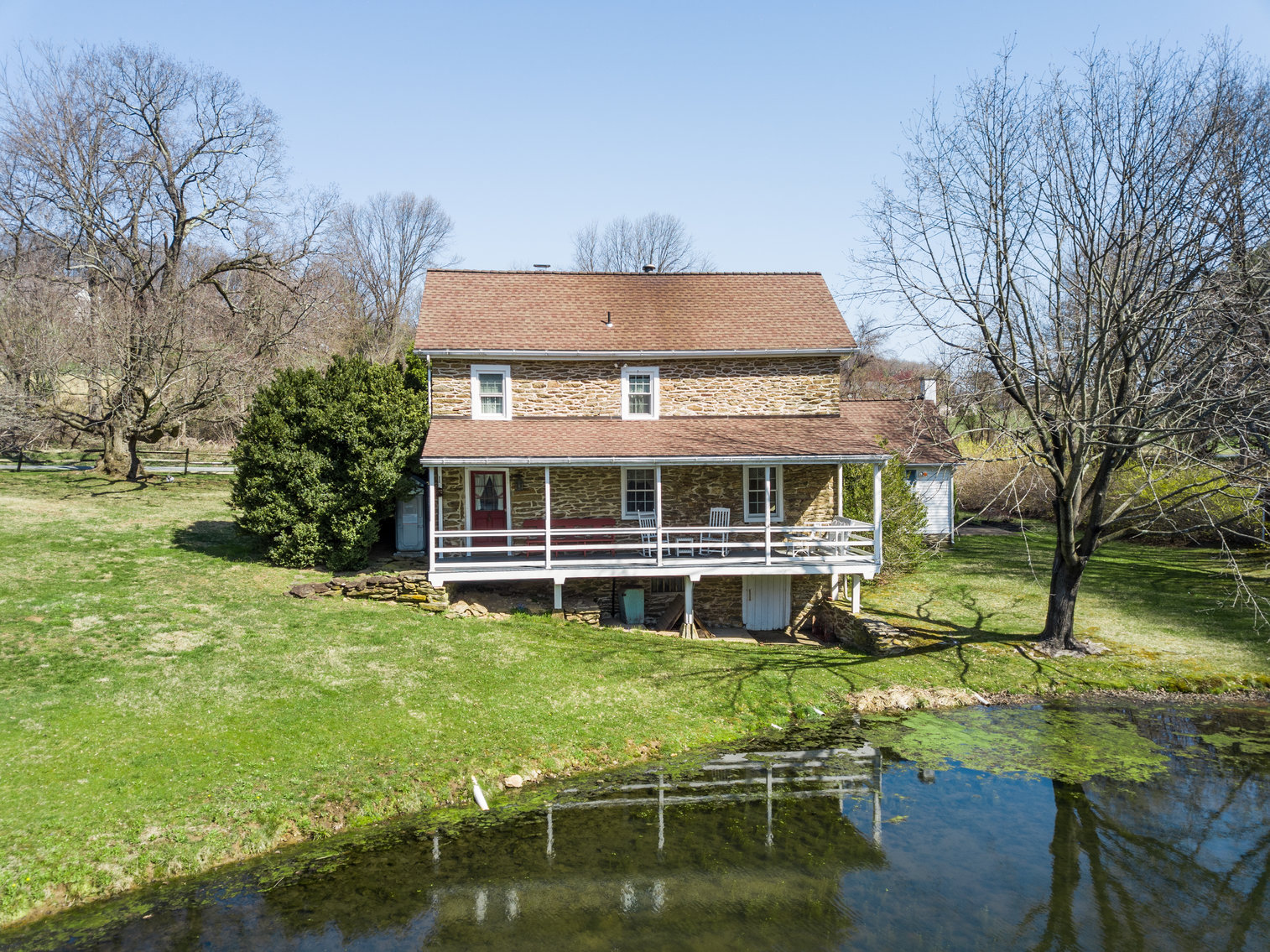 Image for 3 BR, 2.5 BA HISTORIC STONE HOME W/ DETACHED 2 CAR GARAGE & SUMMER HOME OVERLOOKING POND ON 14.04+/- AC