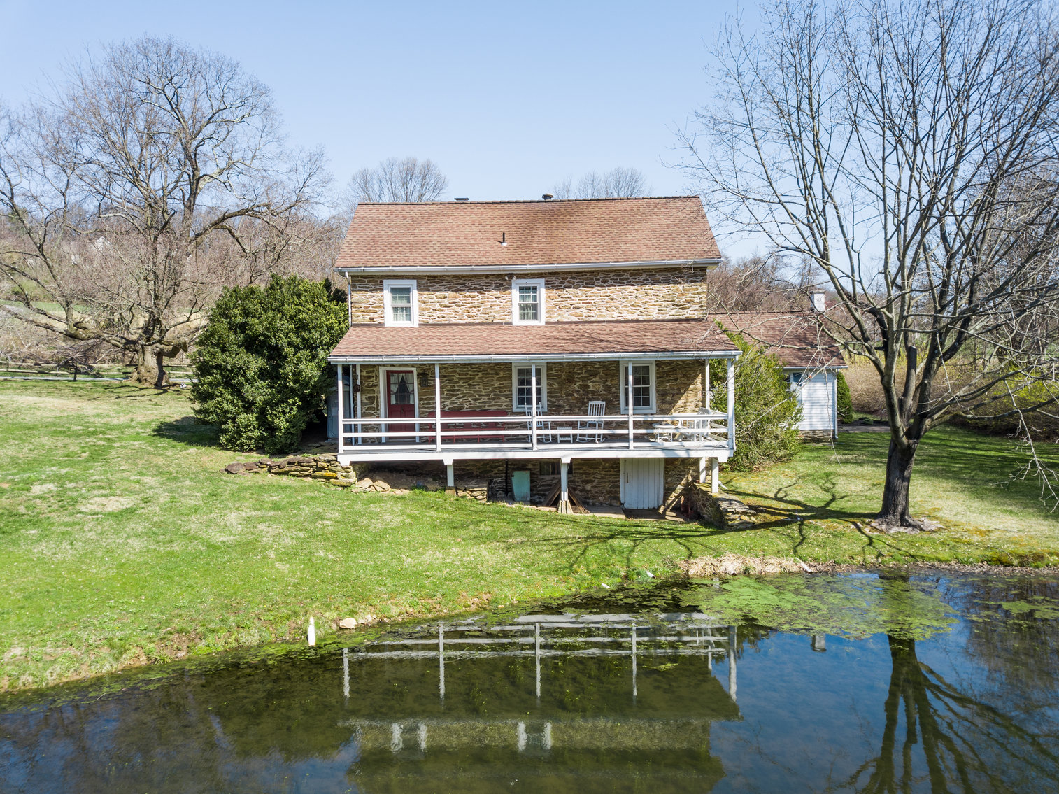 Image for 3 BR, 2.5 BA HISTORIC STONE HOME W/ DETACHED 2 CAR GARAGE & SUMMER HOME OVERLOOKING POND ON 14.04+/- AC