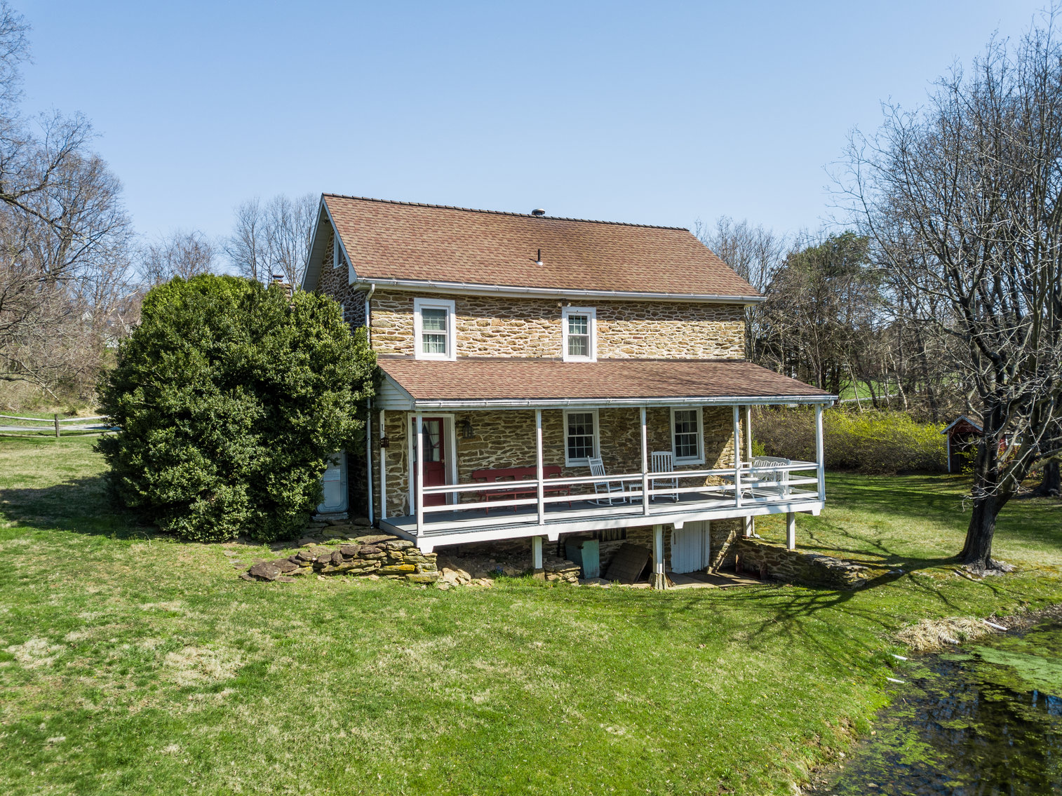Image for 3 BR, 2.5 BA HISTORIC STONE HOME W/ DETACHED 2 CAR GARAGE & SUMMER HOME OVERLOOKING POND ON 14.04+/- AC