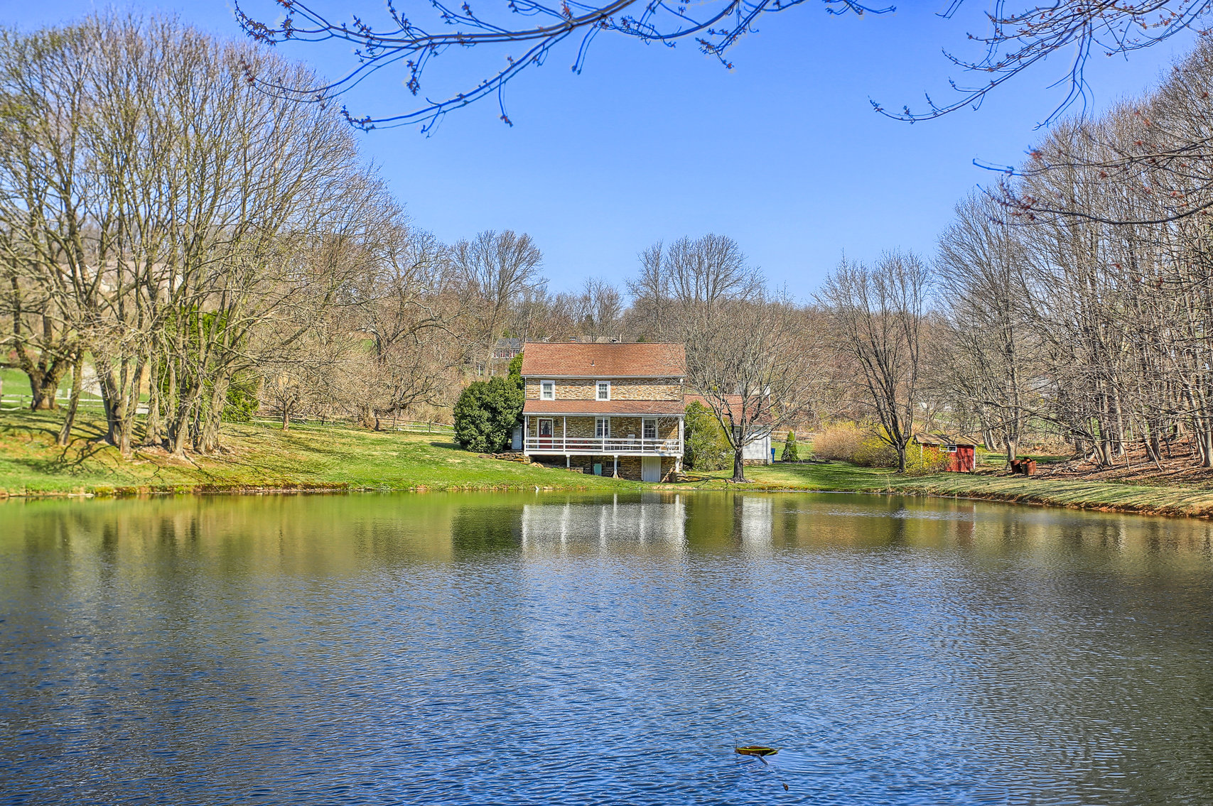 Image for 3 BR, 2.5 BA HISTORIC STONE HOME W/ DETACHED 2 CAR GARAGE & SUMMER HOME OVERLOOKING POND ON 14.04+/- AC