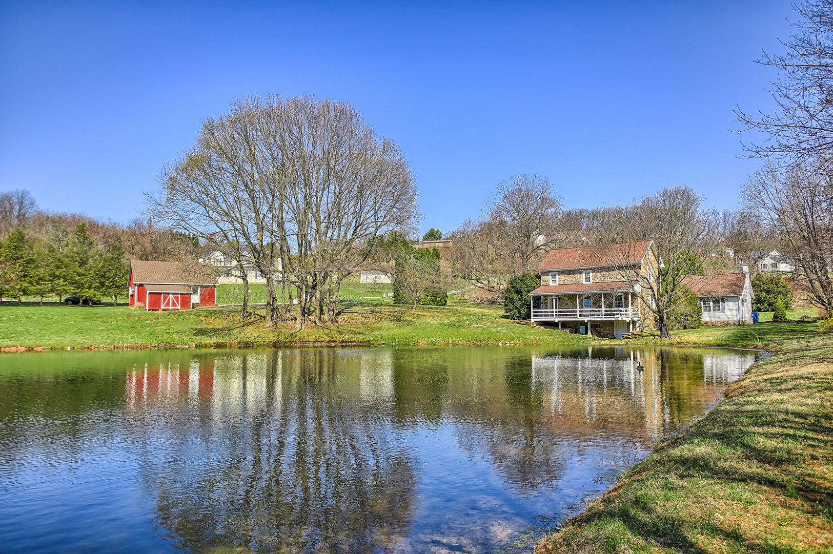 Image for 3 BR, 2.5 BA HISTORIC STONE HOME W/ DETACHED 2 CAR GARAGE & SUMMER HOME OVERLOOKING POND ON 14.04+/- AC