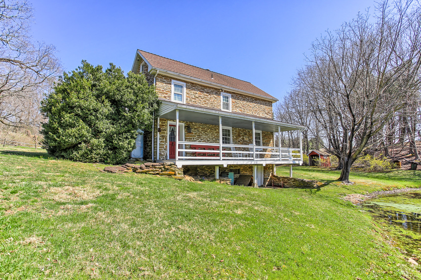 Image for 3 BR, 2.5 BA HISTORIC STONE HOME W/ DETACHED 2 CAR GARAGE & SUMMER HOME OVERLOOKING POND ON 14.04+/- AC