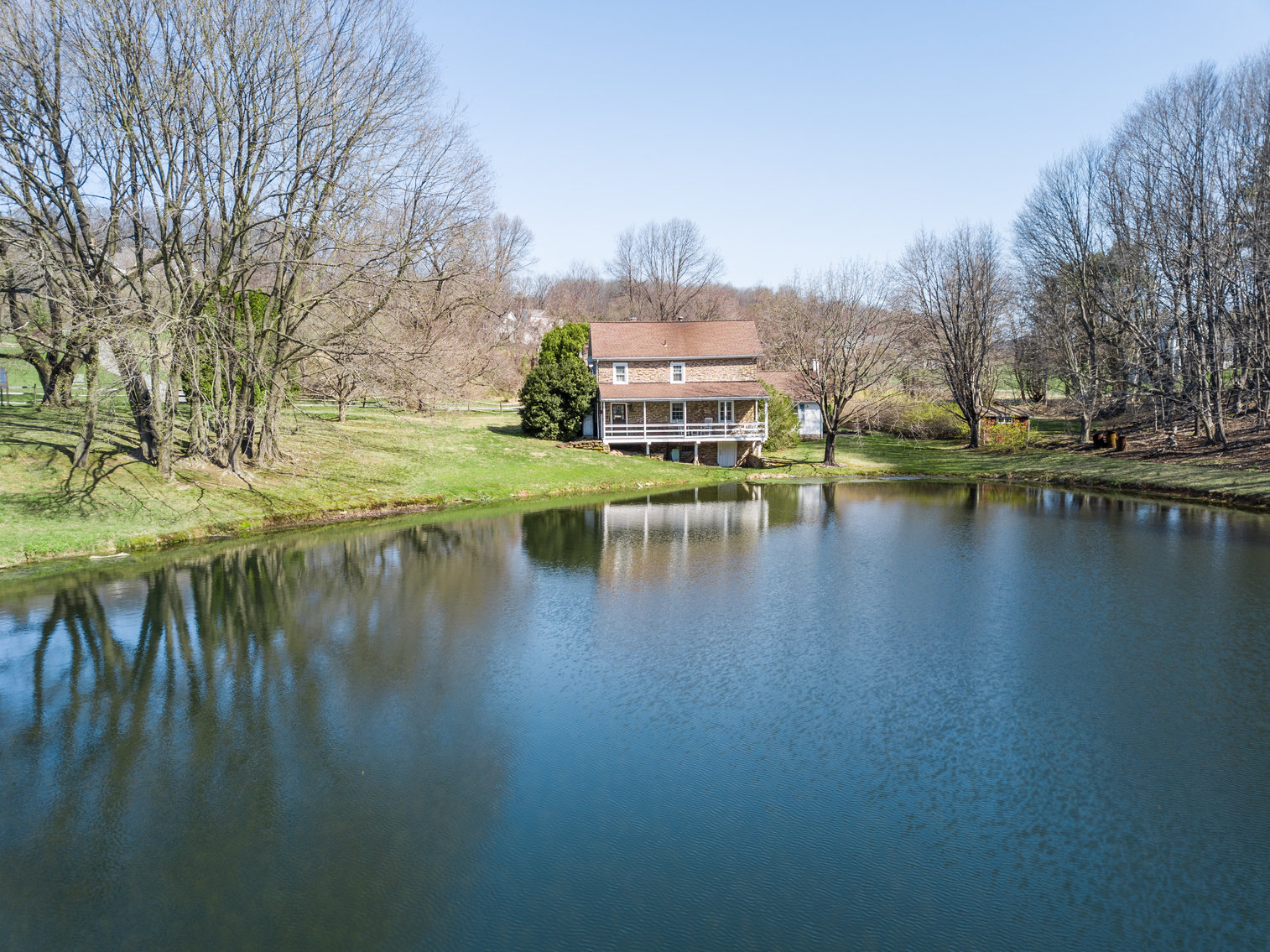 Image for 3 BR, 2.5 BA HISTORIC STONE HOME W/ DETACHED 2 CAR GARAGE & SUMMER HOME OVERLOOKING POND ON 14.04+/- AC