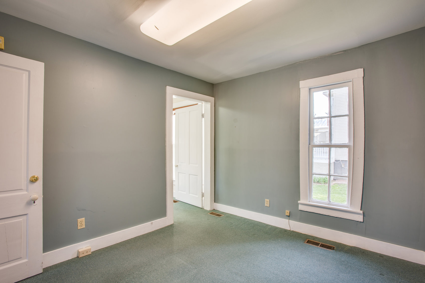 Image for 9 Room/2 half bathroom Home/Office Building (Circa 1905) on .50 +/- Acres in Downtown Louisa, VA