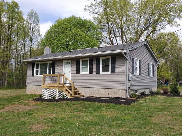 COMPLETELY RENOVATED  3 BEDROOM, 2 BATH VINYL-SIDED RANCHER ON PRIVATE 2.03+/- AC COUNTRY LOT