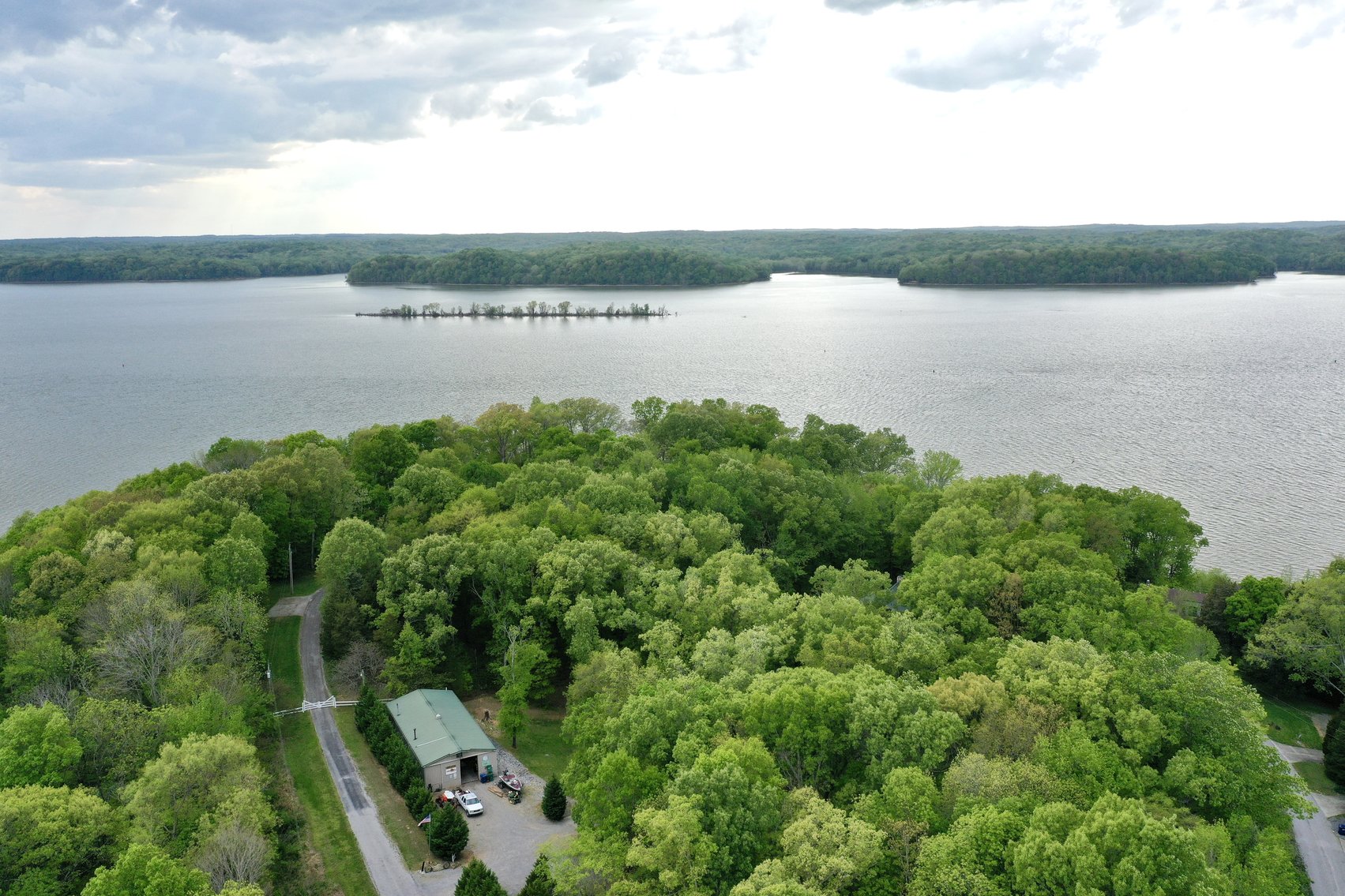 Image for Incredible Lake Barkley Main Channel, Waterfront, Log Home on 2.7+/- acres with a Private DOCK.