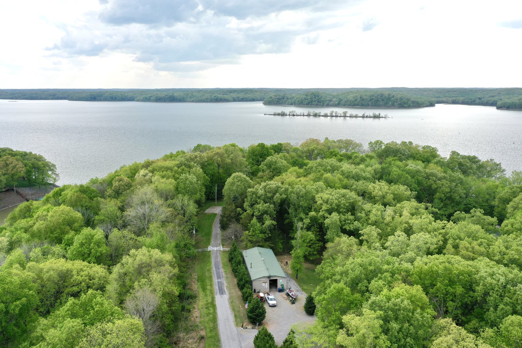 Image for Incredible Lake Barkley Main Channel, Waterfront, Log Home on 2.7+/- acres with a Private DOCK.