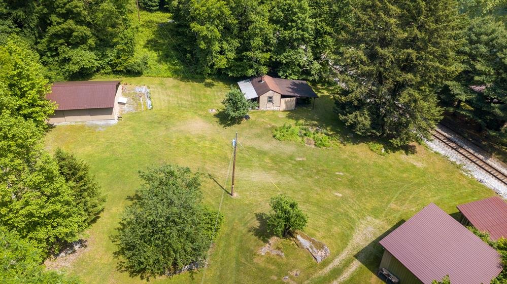 Image for SOLD $280,500 - Tygart Riverfront Camp on 4 Acres