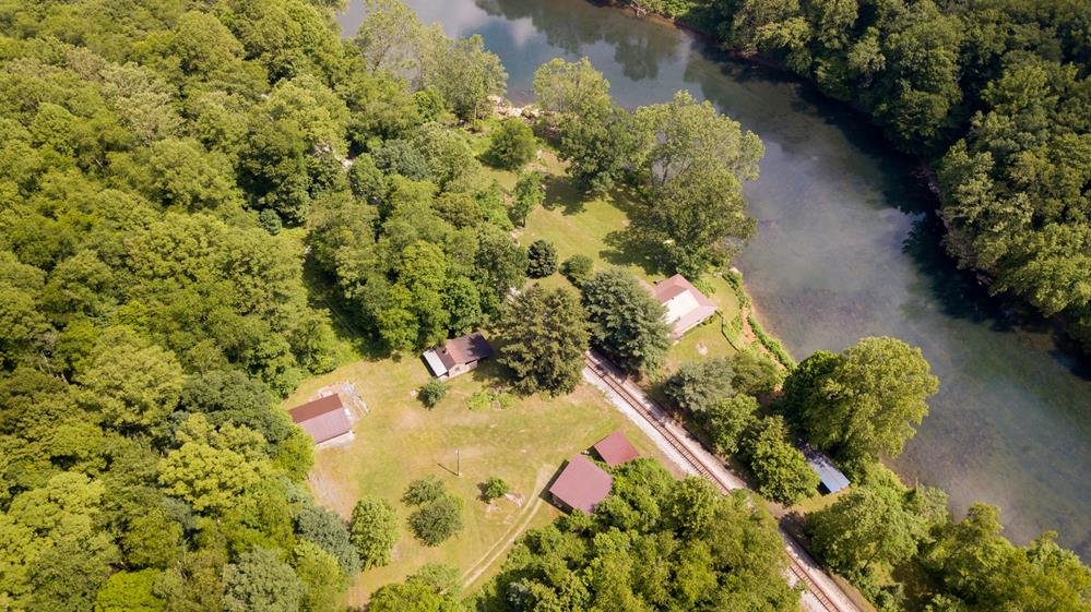 Image for SOLD $280,500 - Tygart Riverfront Camp on 4 Acres