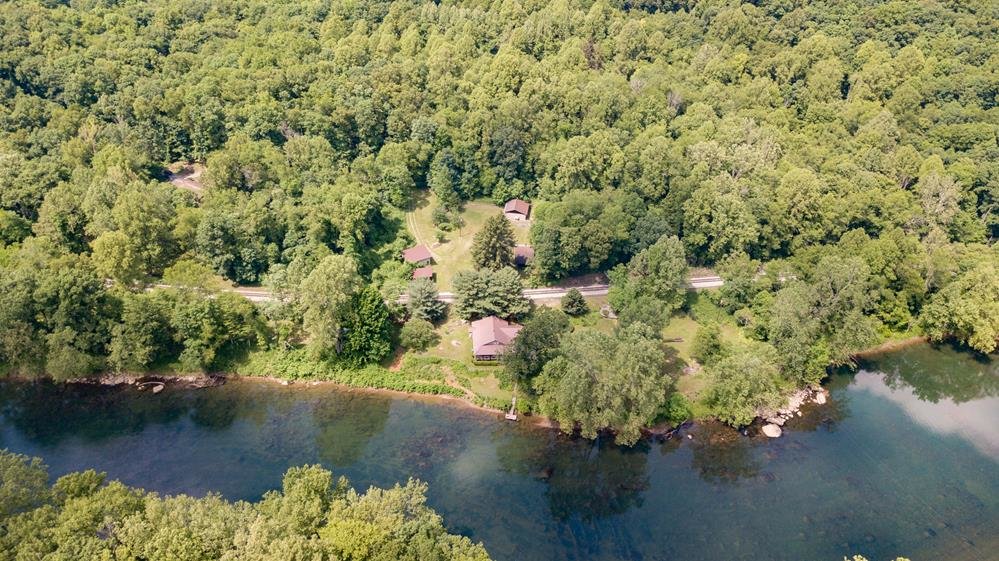 Image for SOLD $280,500 - Tygart Riverfront Camp on 4 Acres