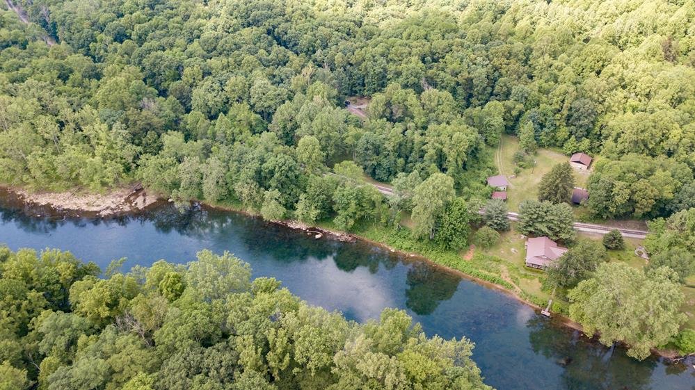 Image for SOLD $280,500 - Tygart Riverfront Camp on 4 Acres