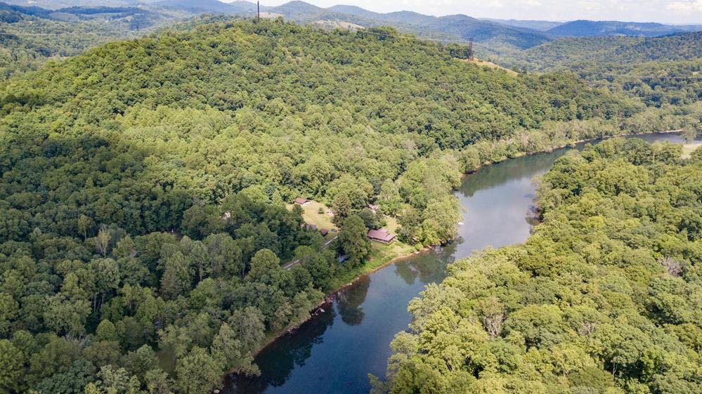 Image for SOLD $280,500 - Tygart Riverfront Camp on 4 Acres