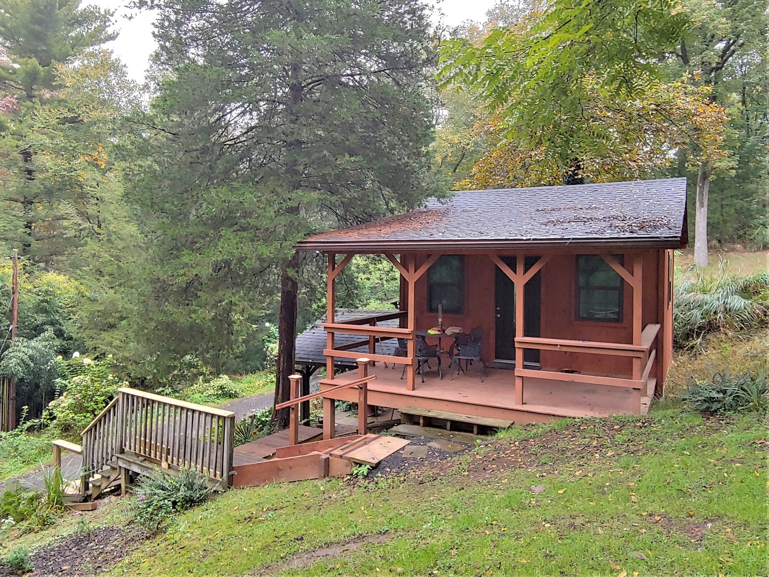 Image for 1 ROOM, 1 BA CABIN AND 2 ROOM LOG CABIN W/ 30’ X 60’ FT BARN/RUN-IN W/ ELECTRIC ON 1.25+/- ACRES