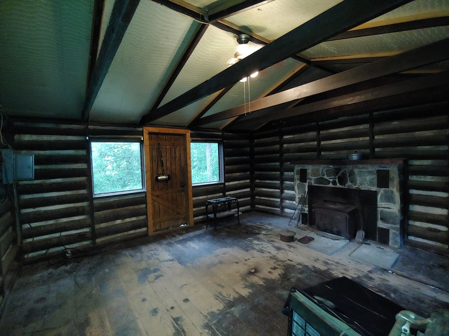 Image for 1 ROOM, 1 BA CABIN AND 2 ROOM LOG CABIN W/ 30’ X 60’ FT BARN/RUN-IN W/ ELECTRIC ON 1.25+/- ACRES