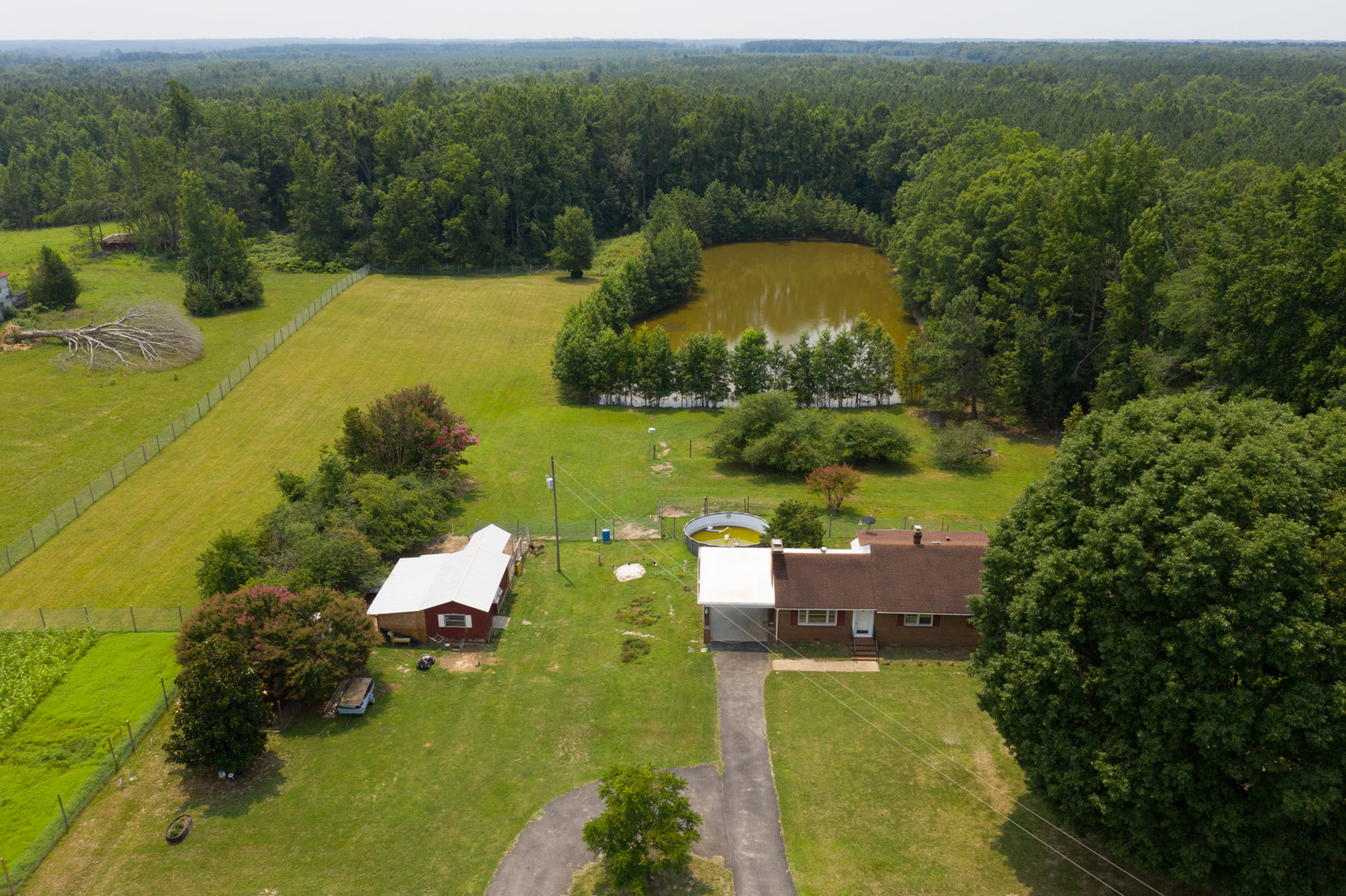 Image for 3 BR/2 BA Brick Rancher Situated on 20± Acres With a Pond - 1,740 SQFT - 4317 Grubby Rd, Wilsons, VA 23894
