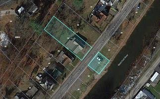 Image for SOLD $26,125 - Riverfront Home Selling to the Highest Bidder