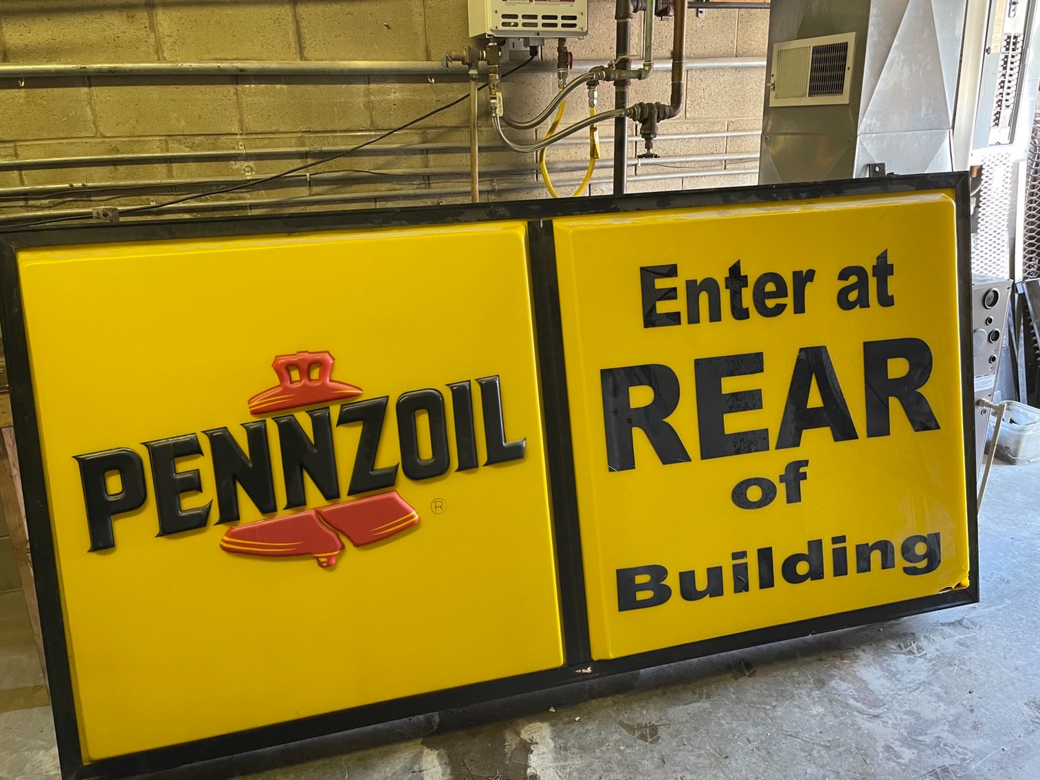 Large lighted Pennzoil Sign