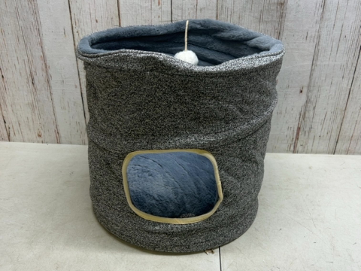 Grey collapsible cat bed with ball 
