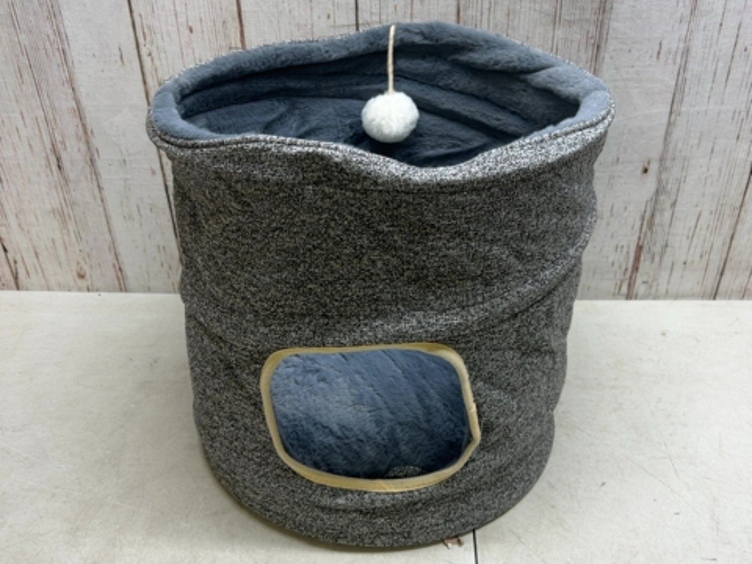 Grey collapsible cat bed with ball 