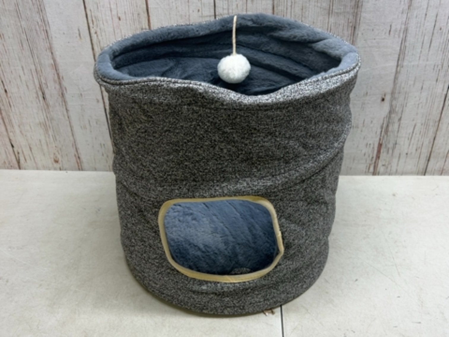 Grey collapsible cat bed with ball 