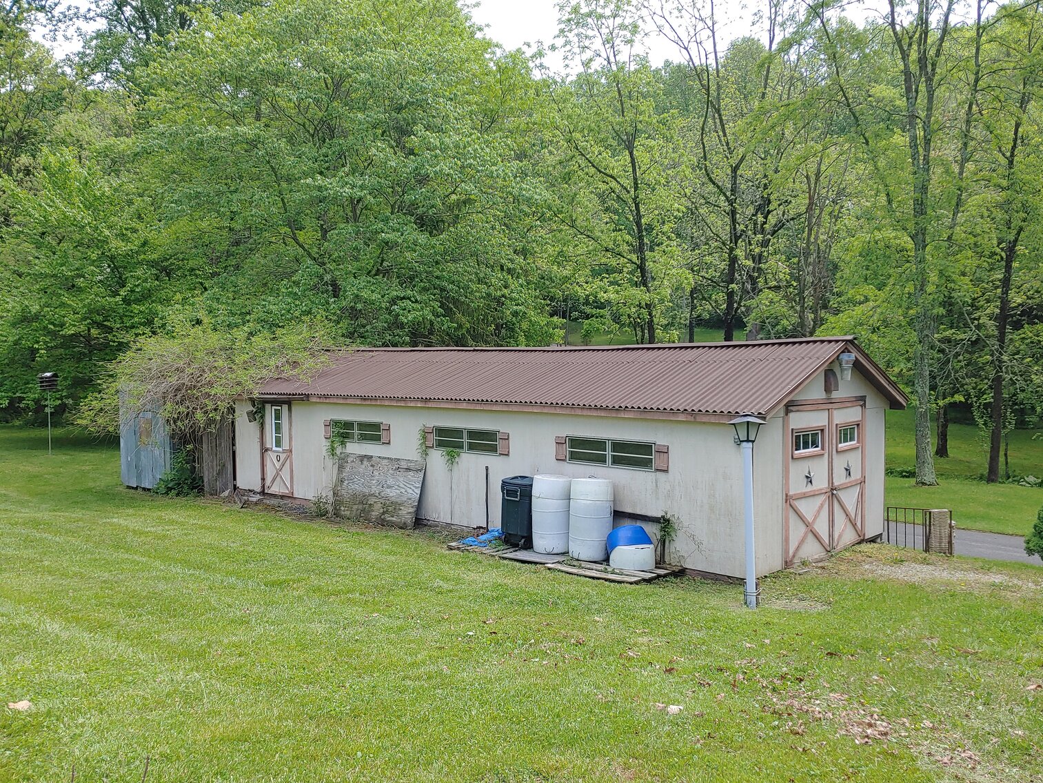 Image for CLEAN RANCHER ON 2.8+/- ACRE LOT W/ 70’ X 15’ STORAGE BULIDING W/ ELECTRIC & LIGHTING