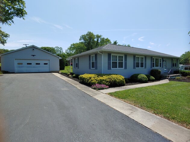 3 BR, 2 BA RANCHER W/ 2-CAR DETACHED GARAGE ON 0.78+/- ACRE CORNER LOT