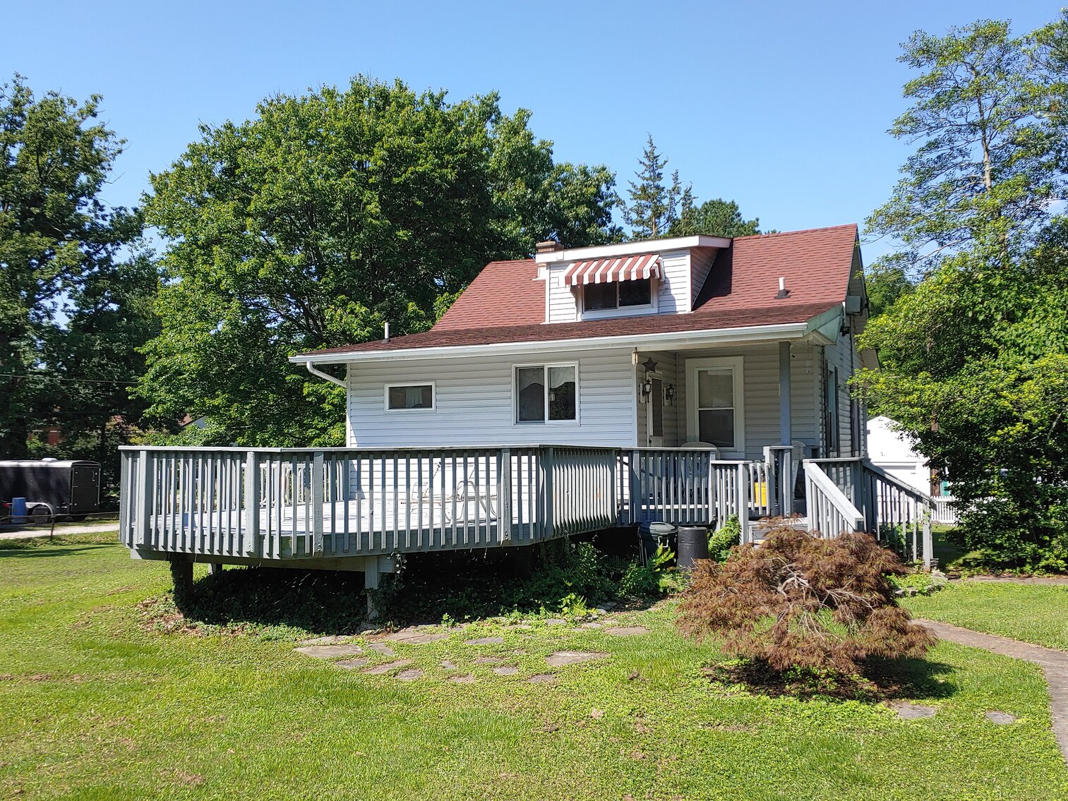 Image for CLEAN VINYL SIDED CAPE COD W/ LARGE DETACHED 2-BAY GARAGE W/ HEAT & AIR ON 0.56+/- ACRES