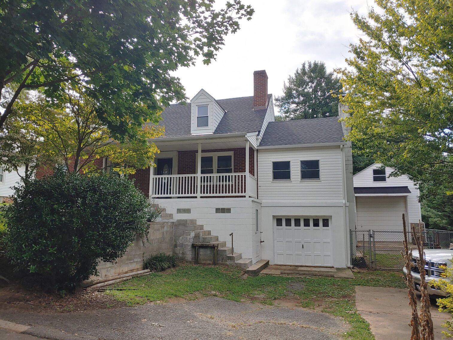 Image for 4 BR, 3 BA BRICK & VINYL SIDED HOME W/ ATT. GARAGE & DET. COMMERCIAL GARAGE W/ OVERSIZED ENTRANCE DOORS ON 0.48+/- ACRES