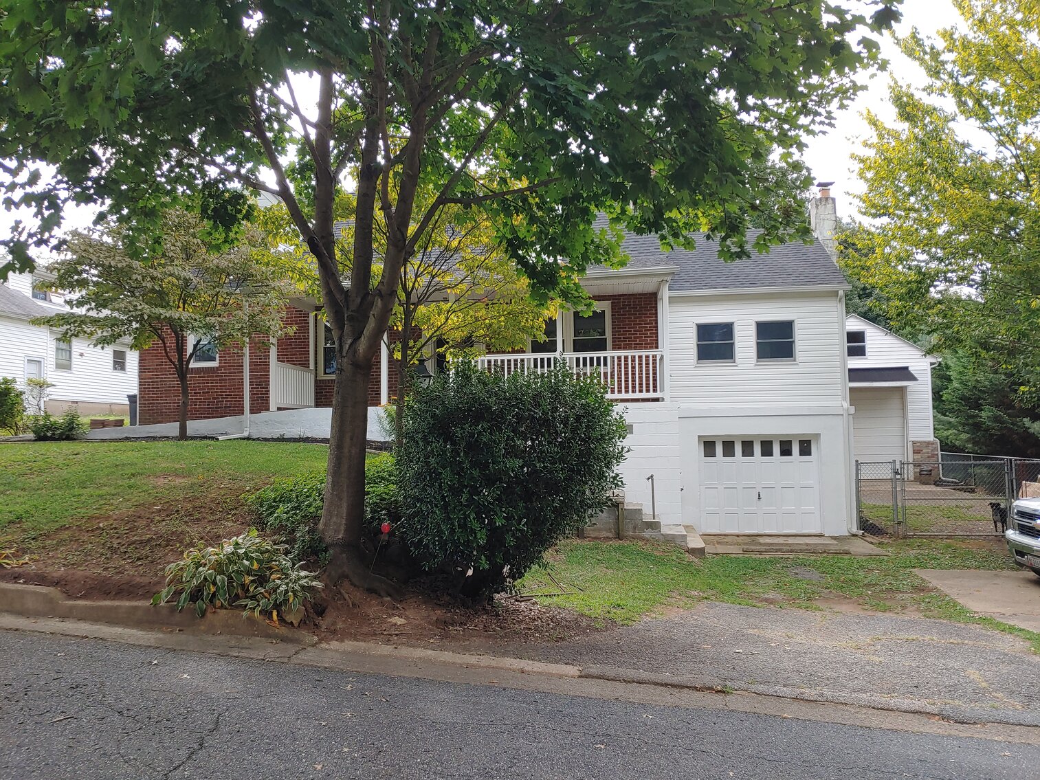 Image for 4 BR, 3 BA BRICK & VINYL SIDED HOME W/ ATT. GARAGE & DET. COMMERCIAL GARAGE W/ OVERSIZED ENTRANCE DOORS ON 0.48+/- ACRES