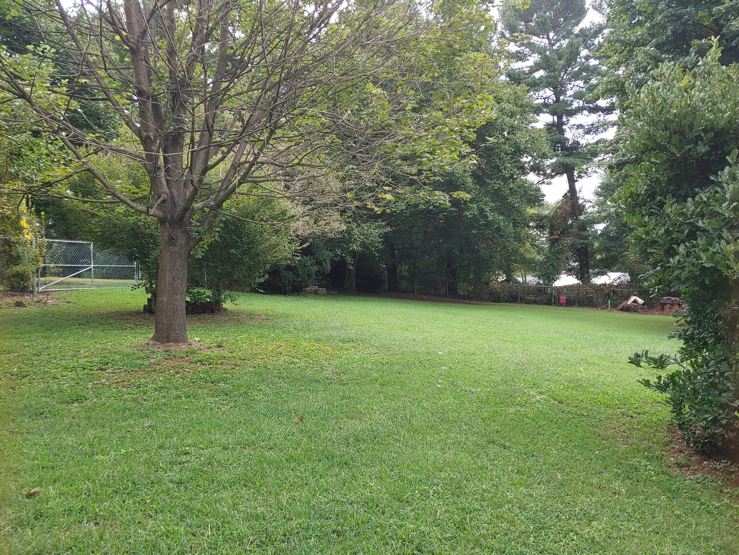 Image for 4 BR, 3 BA BRICK & VINYL SIDED HOME W/ ATT. GARAGE & DET. COMMERCIAL GARAGE W/ OVERSIZED ENTRANCE DOORS ON 0.48+/- ACRES