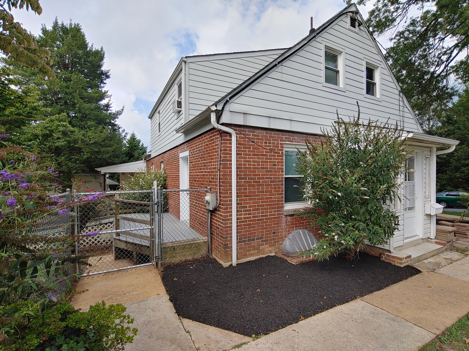 Image for 4 BR, 3 BA BRICK & VINYL SIDED HOME W/ ATT. GARAGE & DET. COMMERCIAL GARAGE W/ OVERSIZED ENTRANCE DOORS ON 0.48+/- ACRES